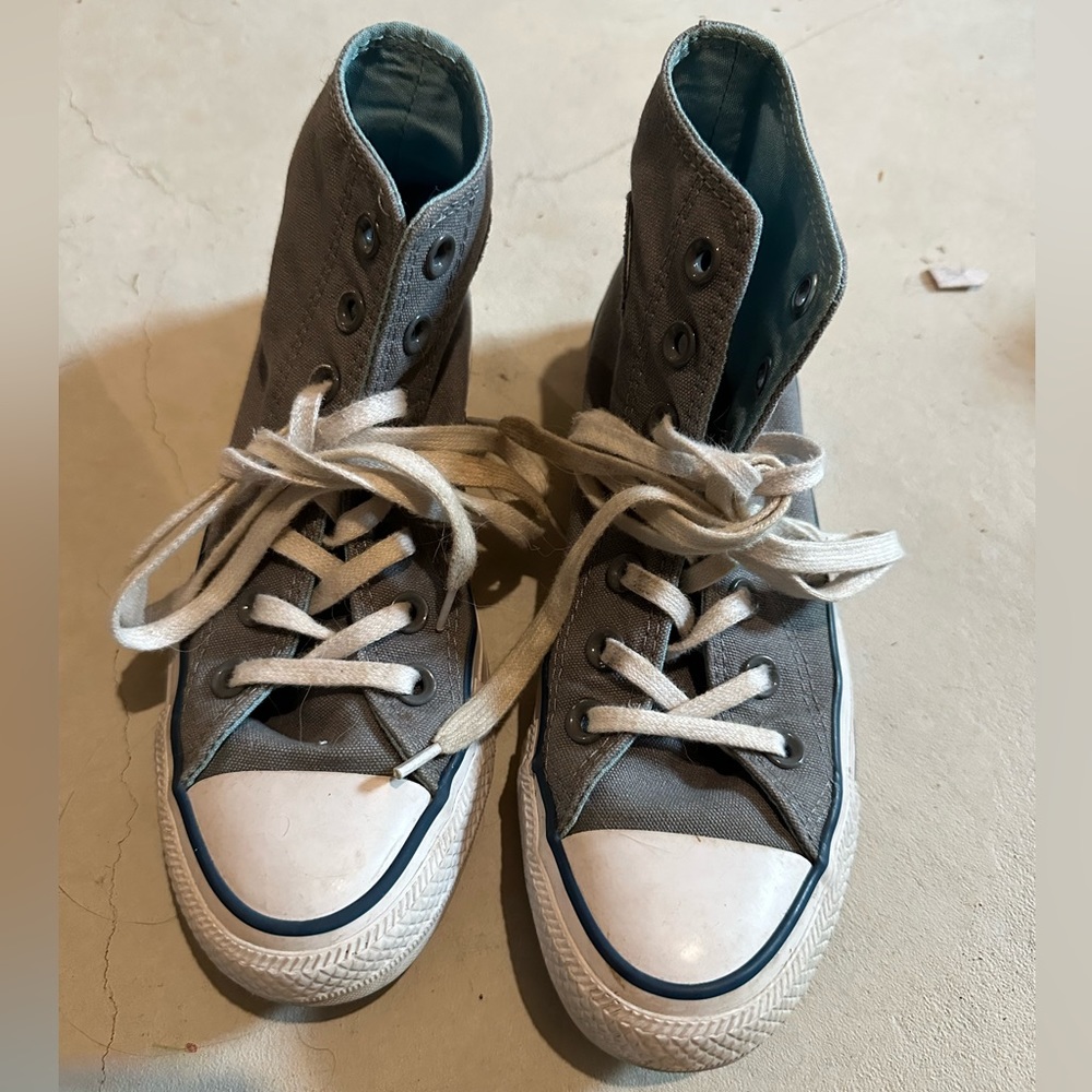 Gray High-top Converse Chuck Taylor’s
